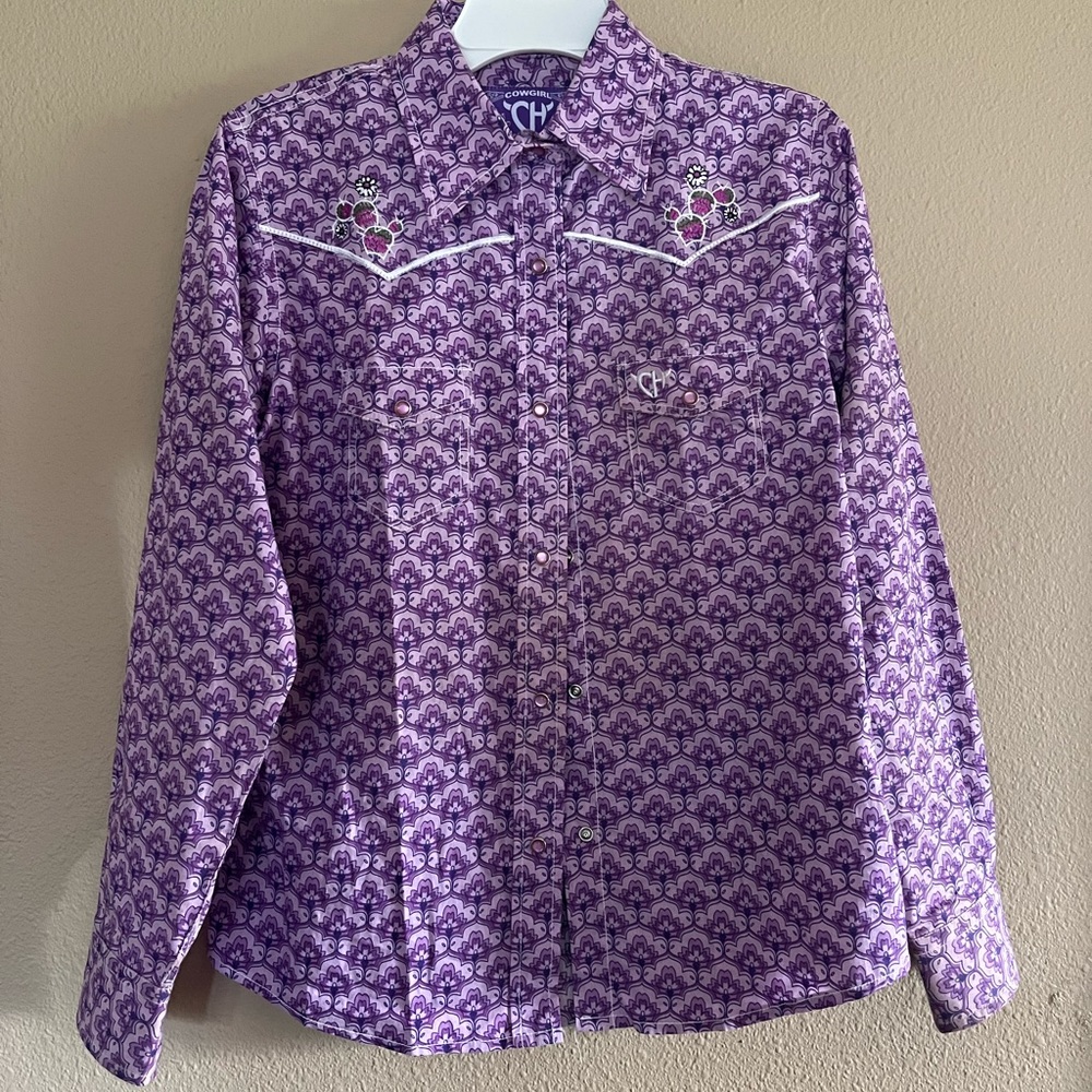 Lightly worn big girls western show shirt size 10/12 with matching show belt.
